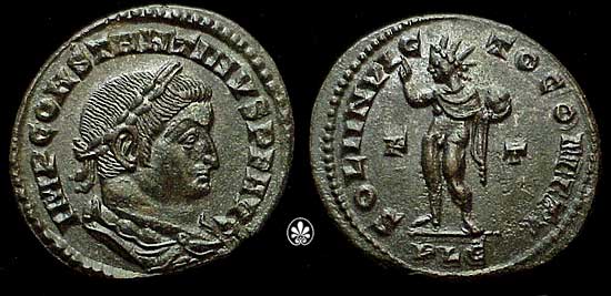 Sol standing facing, head left, right hand raised and holding globe in left